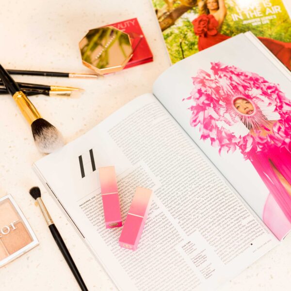 lipstick on magazine with makeup, lifestyle branding shoot in maryland